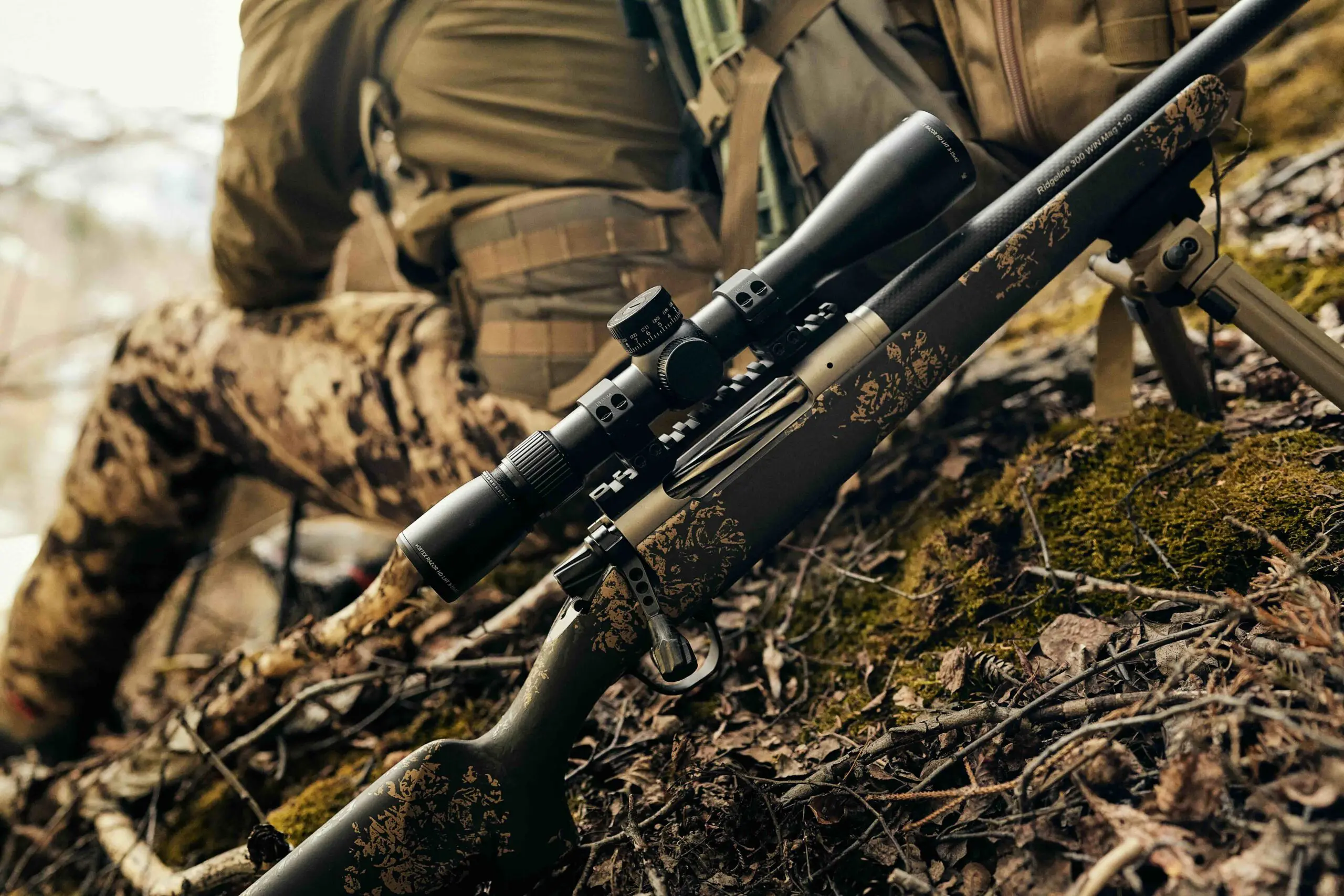 Close view of rifle scope rings and bases mounted on Christensen Arms rifles