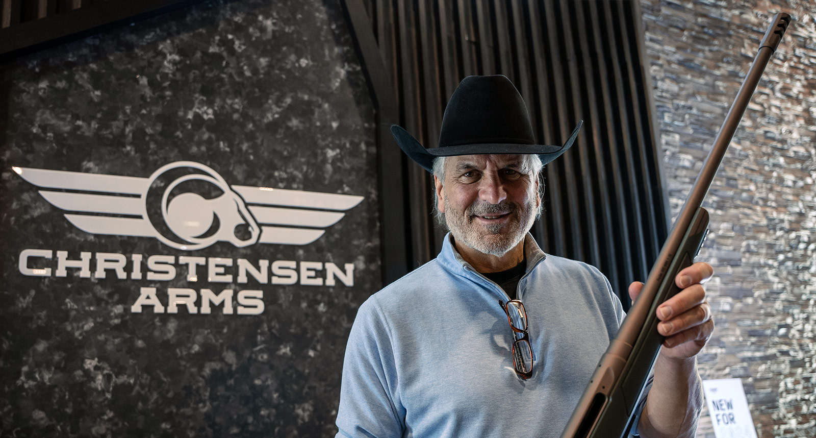 Legendary hunter, Jim Shockey, holding the all new Christensen Arms Evoke rifle at SHOT Show 2024