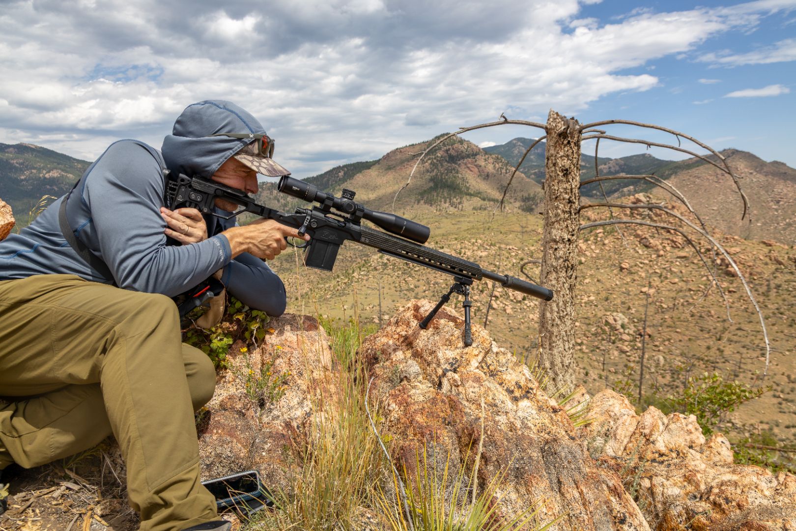 Modern Precision Rifle overlooking open hunting terrain