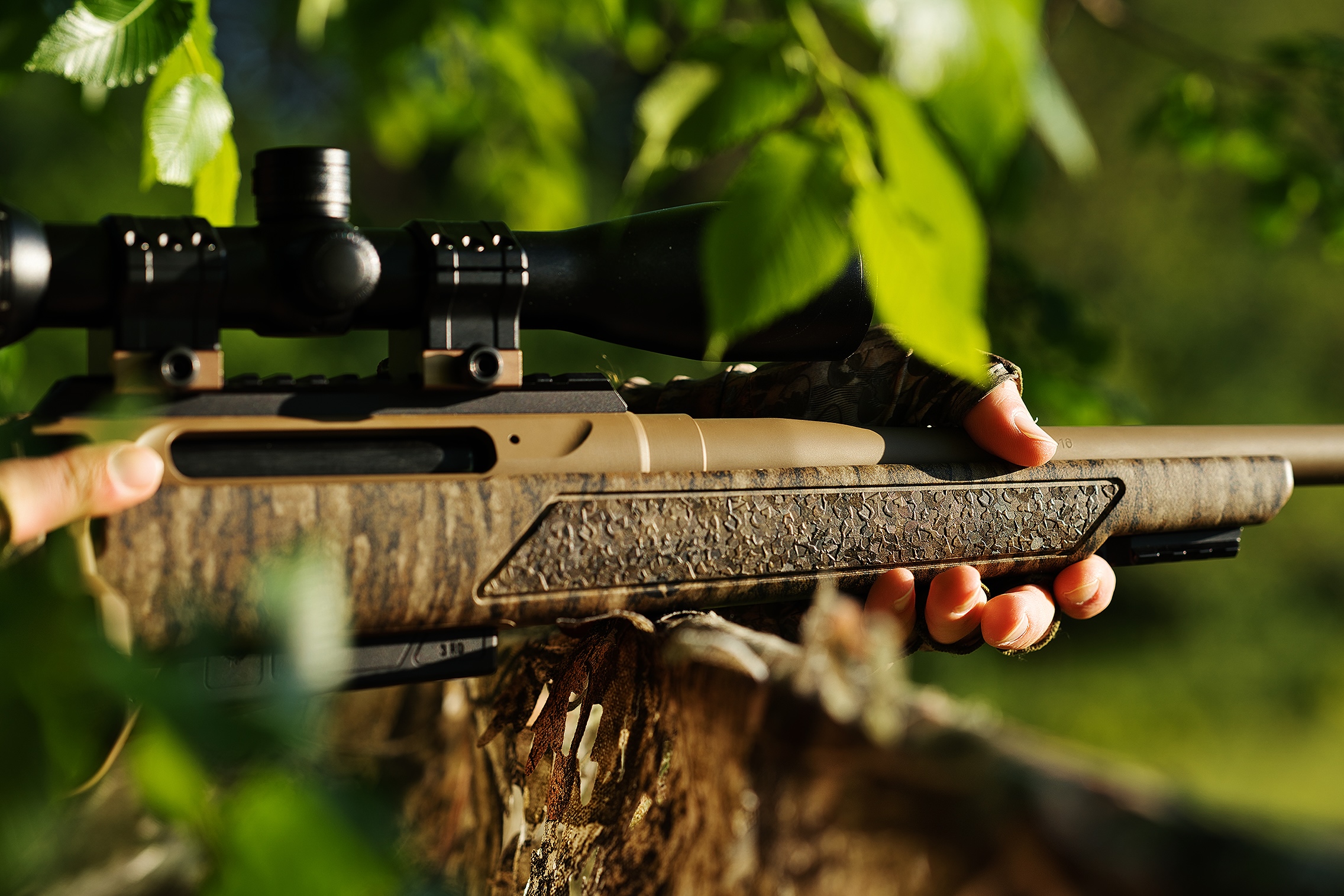 Close-up of the Christensen Arms Evoke receiver, stock, and mounted optic