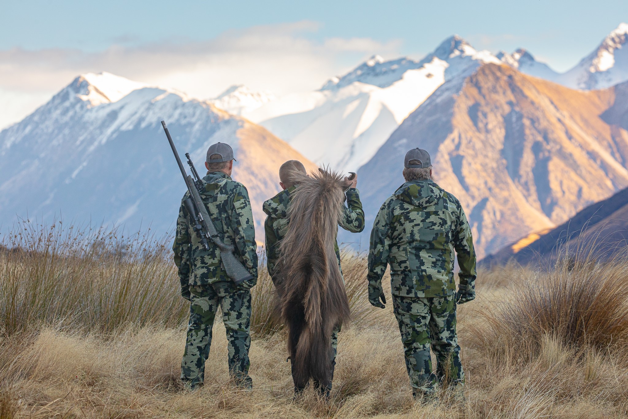 Hunters carrying Christensen Arms gear in New Zealand mountains